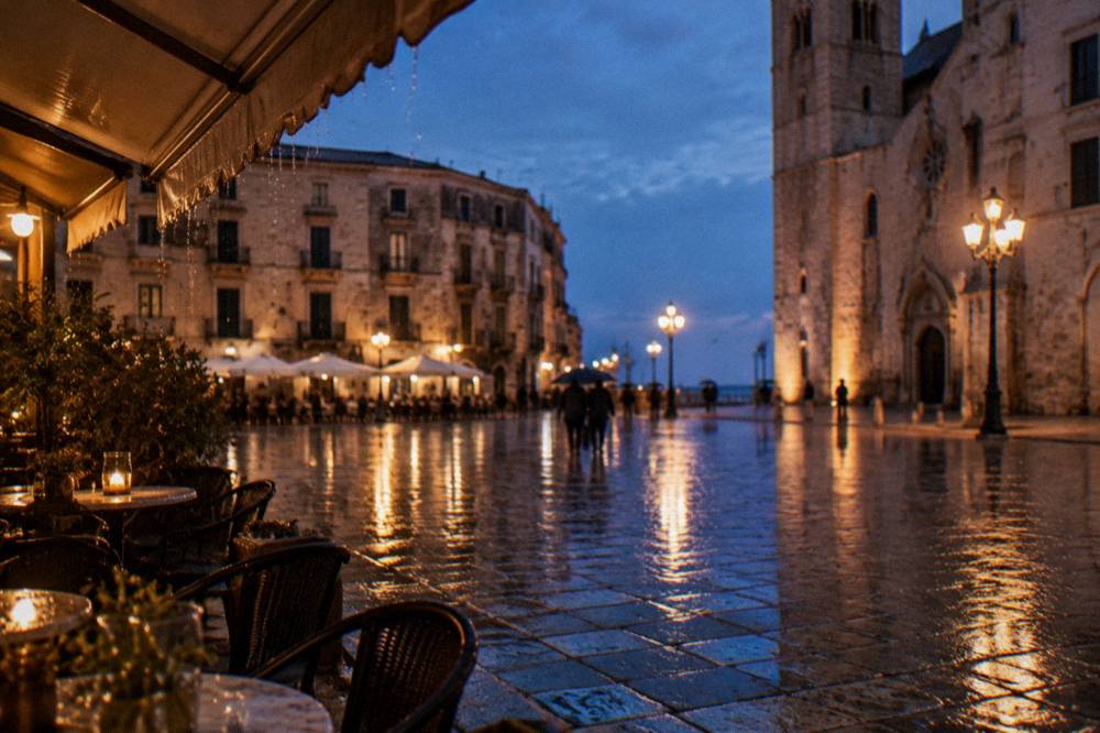 Rainy evening in a pale stone square with wet paving reflecting warm cafe lights and distant umbrellas