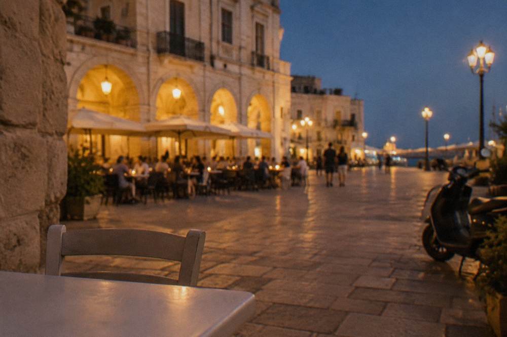 Evening piazza with warm light on cream walls, out-of-focus diners at tables and glowing market arches
